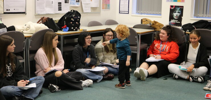 Image of Toddler visits English Language students